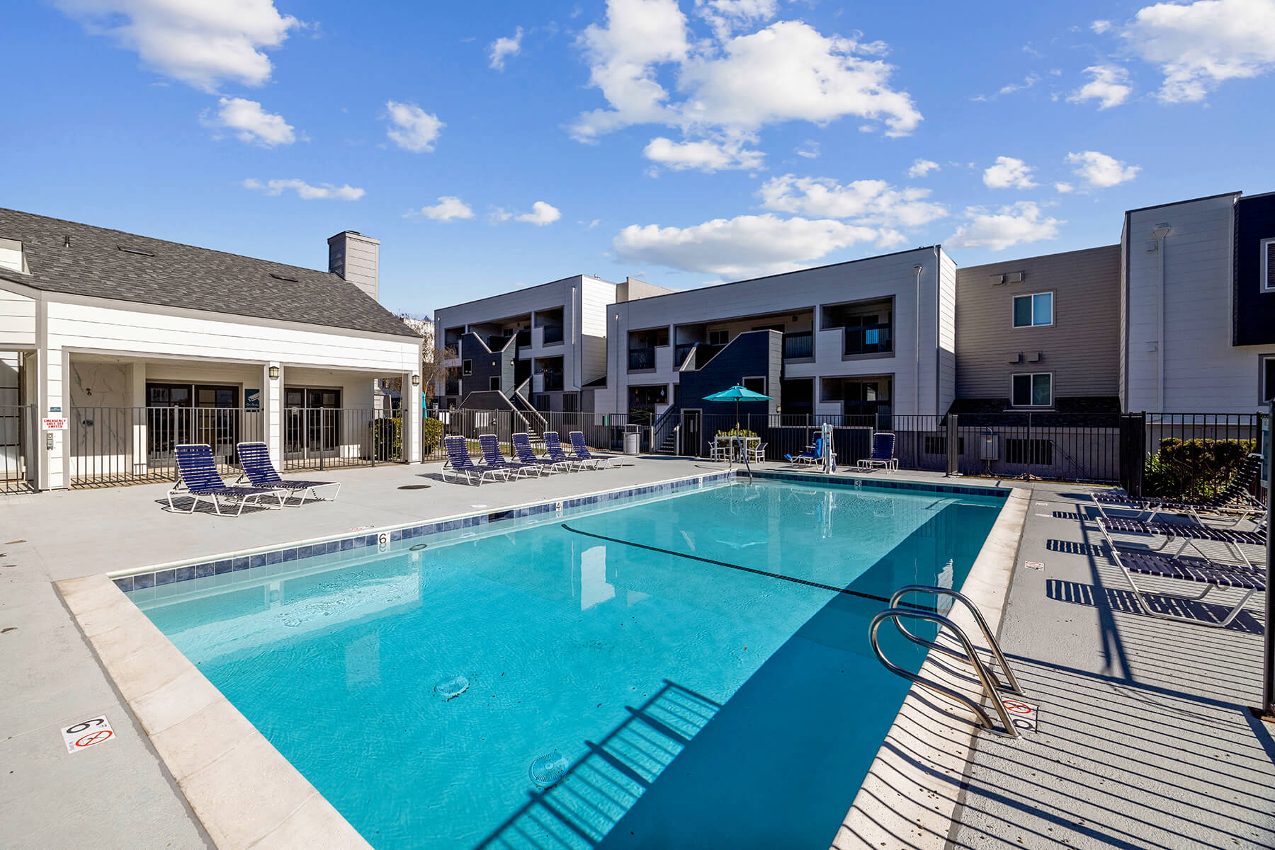 The community pool and clubhouse at the Hilltop Commons Apartments in San Pablo, California.